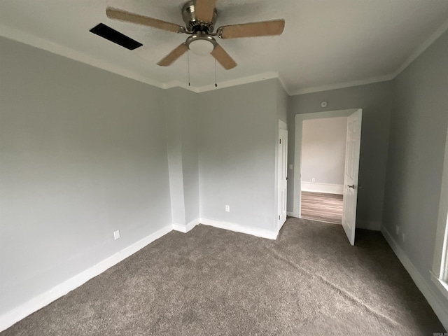 301 W Frazior, Linden, TX 75563 - unfurnished room featuring dark carpet, ceiling fan, ornamental molding, and baseboards