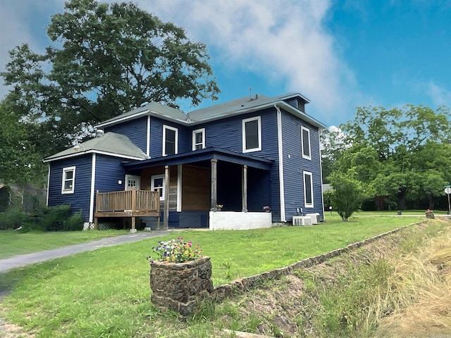 301 W Frazior, Linden, TX 75563 - view of front facade featuring a front lawn and central AC unit