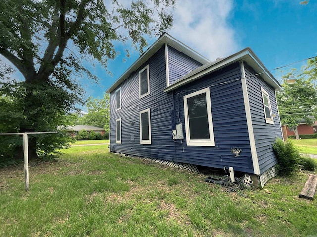 301 W Frazior, Linden, TX 75563 - view of property exterior featuring a yard
