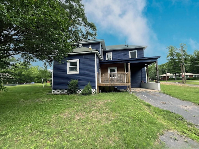 301 W Frazior, Linden, TX 75563 - view of front of property with driveway, a front lawn, and covered porch