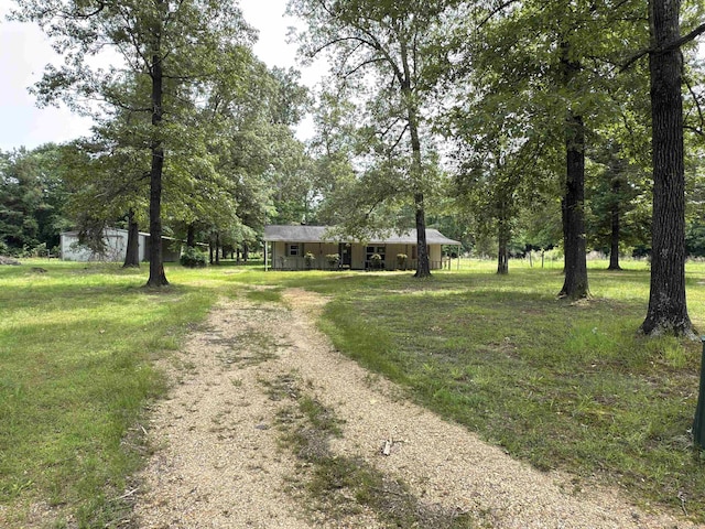 115 Ouachita 551, Camden, AR 71701 - view of front of home featuring dirt driveway and a front lawn