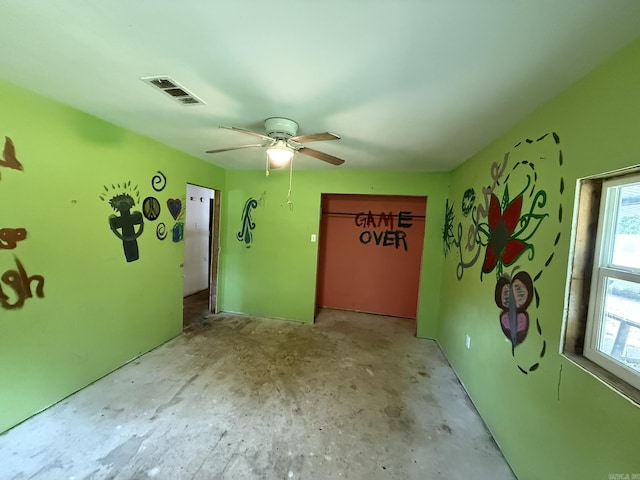 115 Ouachita 551, Camden, AR 71701 - empty room with concrete flooring and ceiling fan