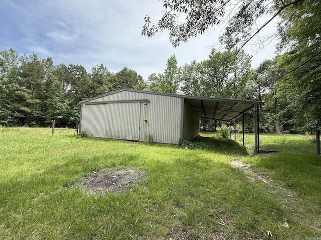 115 Ouachita 551, Camden, AR 71701 - view of pole building featuring a lawn and driveway