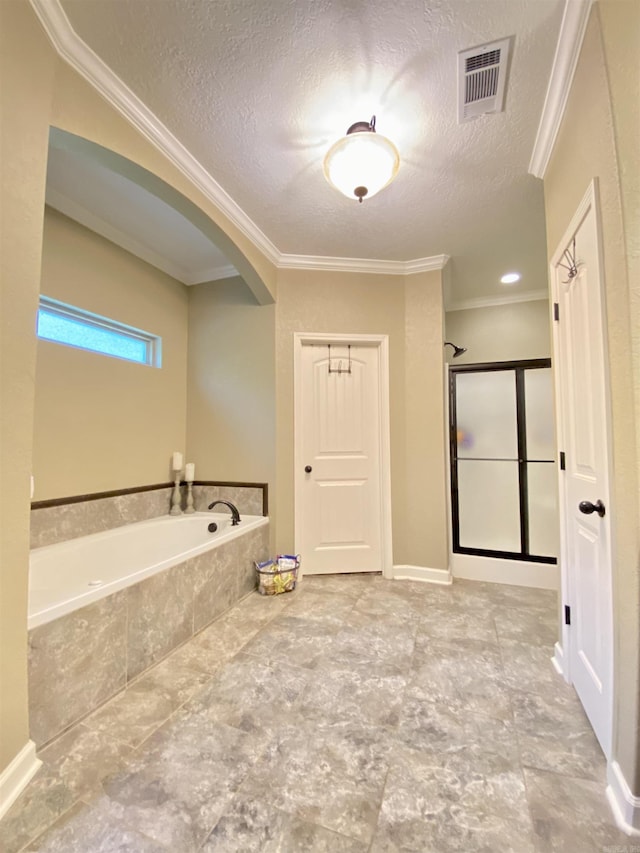 3008 Lilly Ln, Benton, AR 72019 - full bath featuring a garden tub, crown molding, a stall shower, and a textured ceiling