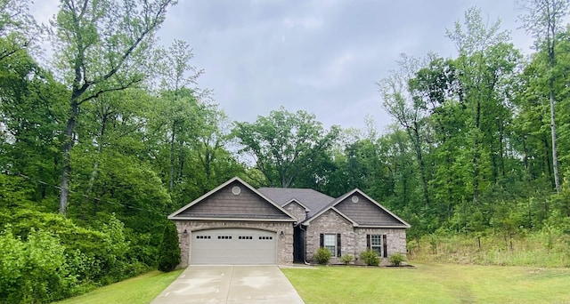 3008 Lilly Ln, Benton, AR 72019 - view of front of home featuring concrete driveway, a front yard, an attached garage, and brick siding