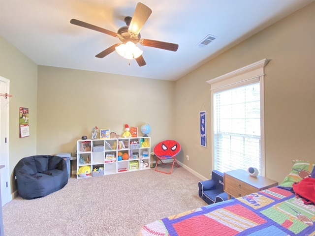 3008 Lilly Ln, Benton, AR 72019 - carpeted bedroom featuring a ceiling fan and baseboards