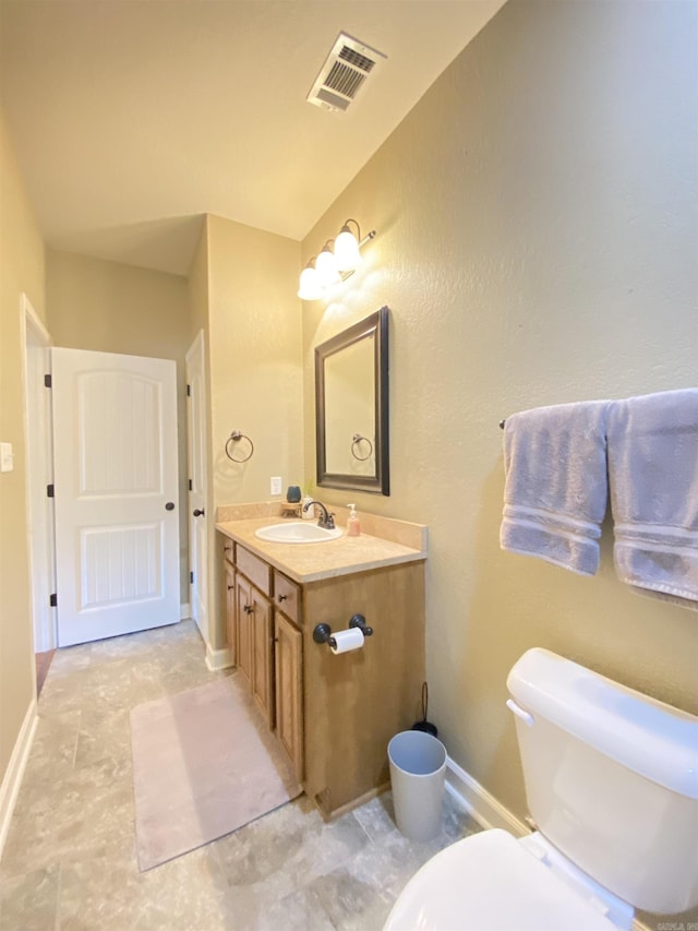 3008 Lilly Ln, Benton, AR 72019 - half bathroom featuring vanity, toilet, and baseboards