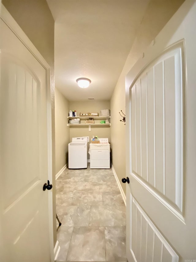 3008 Lilly Ln, Benton, AR 72019 - washroom with washer and clothes dryer, baseboards, and radiator