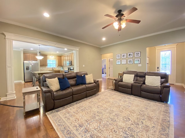 3008 Lilly Ln, Benton, AR 72019 - living room featuring dark wood-type flooring, ceiling fan, baseboards, recessed lighting, and ornamental molding