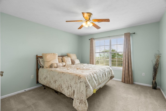 40 Pine Mountain Dr, Conway, AR 72034 - bedroom with light colored carpet, baseboards, and ceiling fan