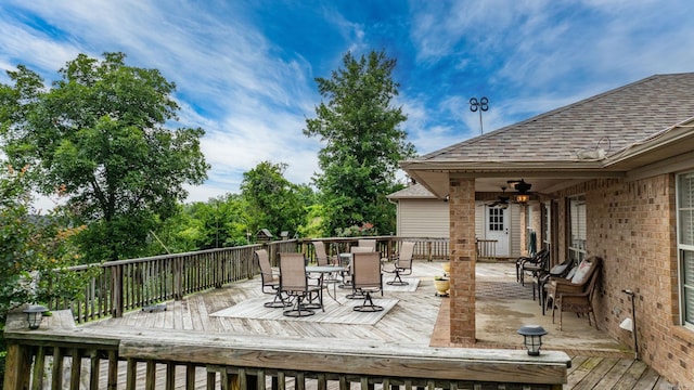 40 Pine Mountain Dr, Conway, AR 72034 - wooden deck with outdoor dining area and ceiling fan