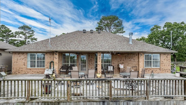 40 Pine Mountain Dr, Conway, AR 72034 - rear view of house with brick siding, roof with shingles, a deck, ceiling fan, and a patio area