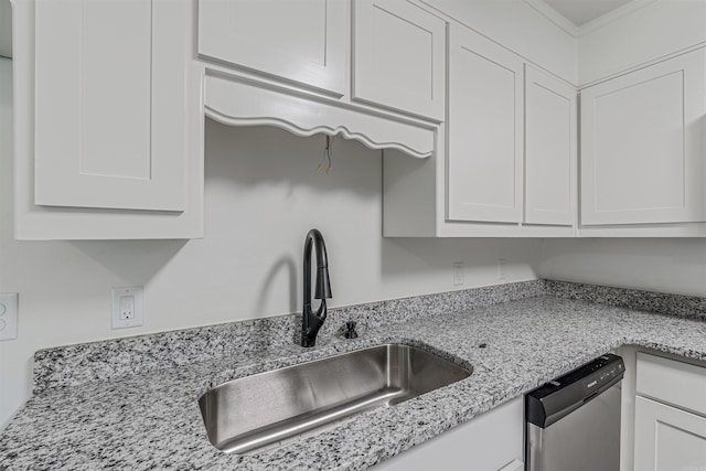 612 Briar St, Sherwood, AR 72120 - kitchen with dishwasher, a sink, and white cabinetry