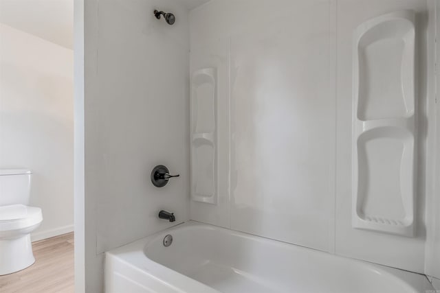 612 Briar St, Sherwood, AR 72120 - bathroom featuring toilet, bathing tub / shower combination, and wood finished floors