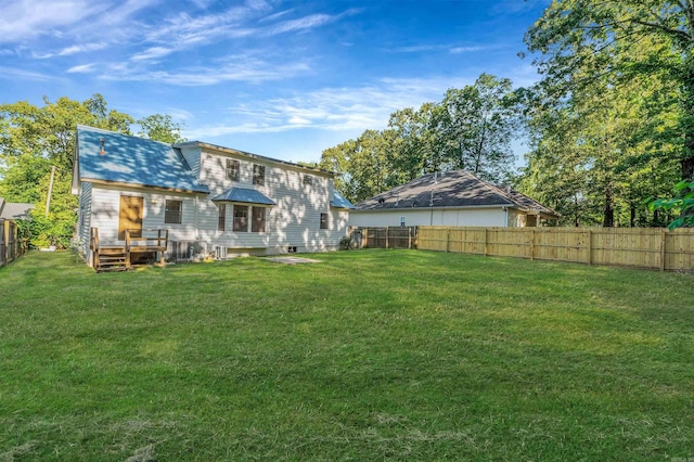 612 Briar St, Sherwood, AR 72120 - back of property featuring a wooden deck