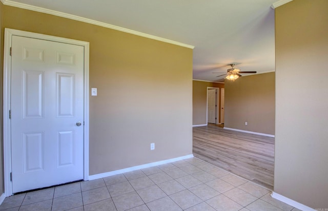 9808 Lanehart Rd, Little Rock, AR 72204 - unfurnished room featuring crown molding, baseboards, a ceiling fan, and light tile patterned floors