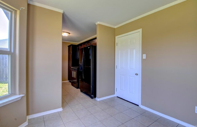9808 Lanehart Rd, Little Rock, AR 72204 - spare room featuring ornamental molding, baseboards, and light tile patterned floors