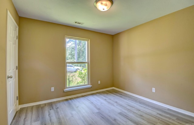 9808 Lanehart Rd, Little Rock, AR 72204 - empty room featuring wood finished floors and baseboards