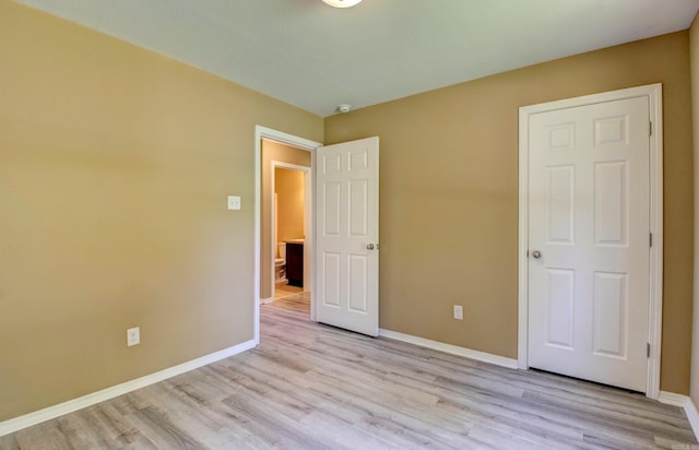 9808 Lanehart Rd, Little Rock, AR 72204 - unfurnished bedroom with light wood-style floors and baseboards