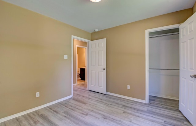 9808 Lanehart Rd, Little Rock, AR 72204 - unfurnished bedroom with light wood-type flooring, baseboards, and a closet