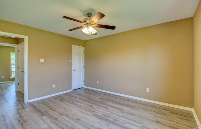 9808 Lanehart Rd, Little Rock, AR 72204 - spare room featuring light wood finished floors, ceiling fan, and baseboards