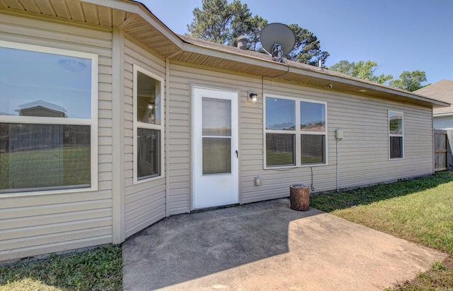 9808 Lanehart Rd, Little Rock, AR 72204 - property entrance with a patio area and a lawn