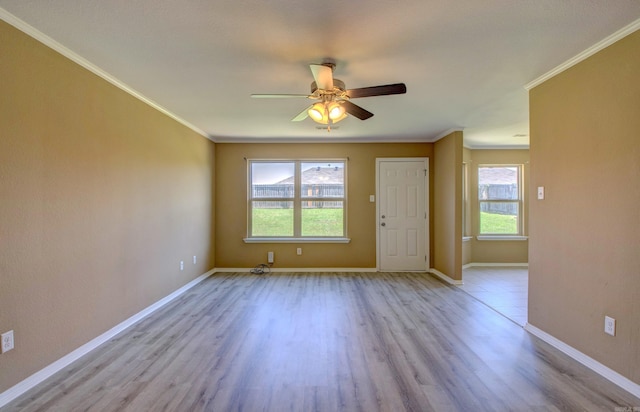 9808 Lanehart Rd, Little Rock, AR 72204 - unfurnished room with a ceiling fan, wood finished floors, crown molding, and baseboards