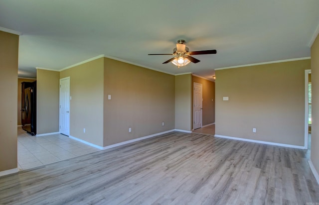 9808 Lanehart Rd, Little Rock, AR 72204 - empty room with wood finished floors, ceiling fan, crown molding, and baseboards