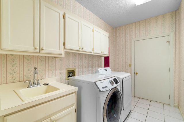 29 Barcelona Way, Hot Springs Village, AR 71909 - washroom featuring cabinet space, wallpapered walls, independent washer and dryer, light tile patterned flooring, and a textured ceiling