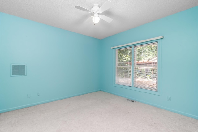 29 Barcelona Way, Hot Springs Village, AR 71909 - unfurnished room featuring light carpet, a ceiling fan, baseboards, and a textured ceiling