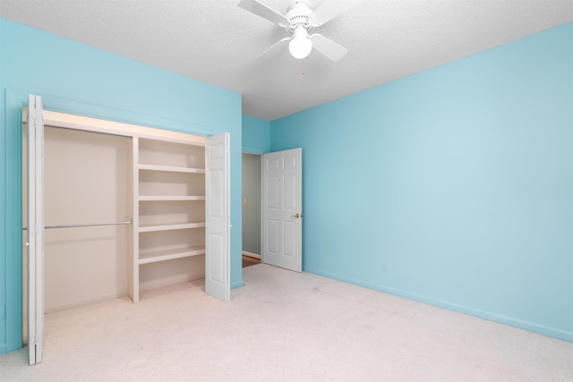 29 Barcelona Way, Hot Springs Village, AR 71909 - unfurnished bedroom with carpet floors, ceiling fan, baseboards, a textured ceiling, and a closet