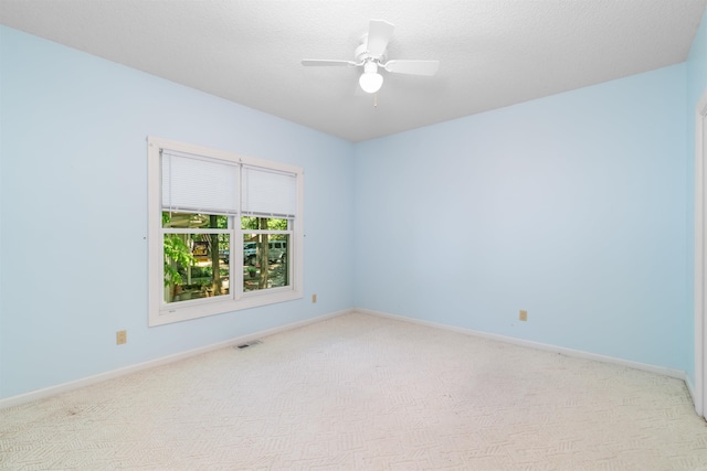 29 Barcelona Way, Hot Springs Village, AR 71909 - unfurnished room with light carpet, baseboards, and a ceiling fan