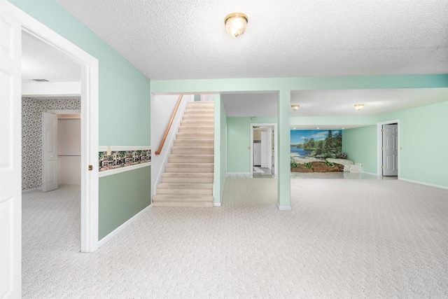 29 Barcelona Way, Hot Springs Village, AR 71909 - below grade area featuring carpet floors, stairway, a textured ceiling, and baseboards