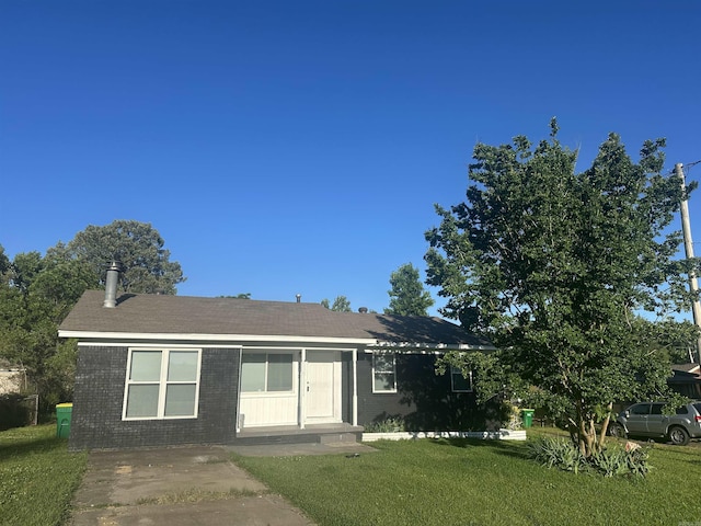 8312 Walkers Dr, North Little Rock, AR 72117 - single story home with brick siding and a front lawn