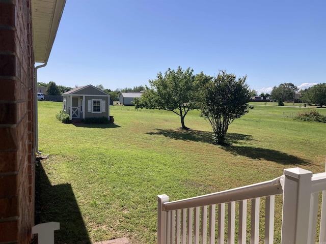 6 Donnie Cv, Greenbrier, AR 72058 - view of grassy yard with an outbuilding