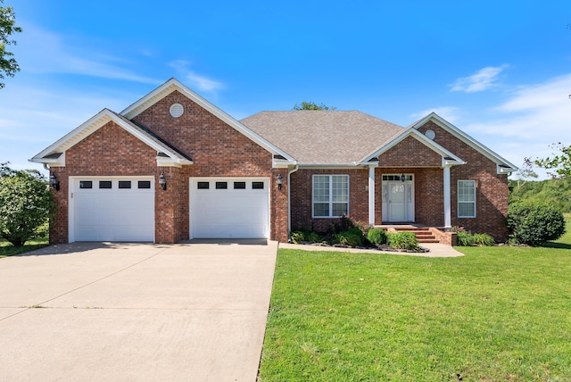6 Donnie Cv, Greenbrier, AR 72058 - ranch-style home with driveway, a front lawn, an attached garage, and brick siding