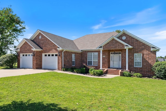 6 Donnie Cv, Greenbrier, AR 72058 - view of front of house featuring concrete driveway, an attached garage, brick siding, a front lawn, and a shingled roof