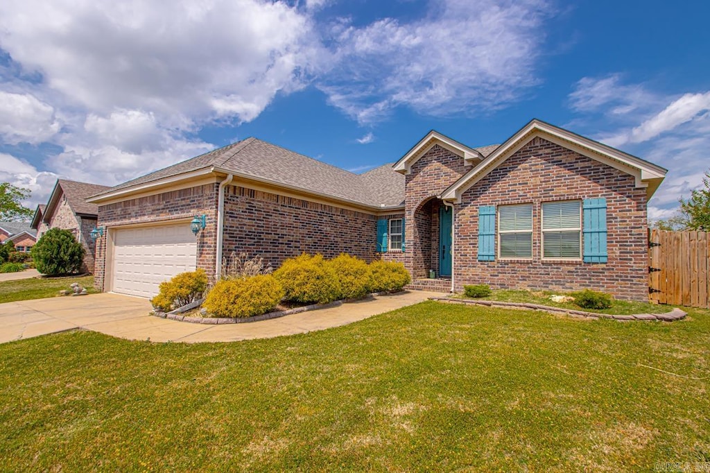 616 Hideaway Cir, Alexander, AR 72002 - ranch-style home featuring brick siding, a garage, driveway, and a shingled roof