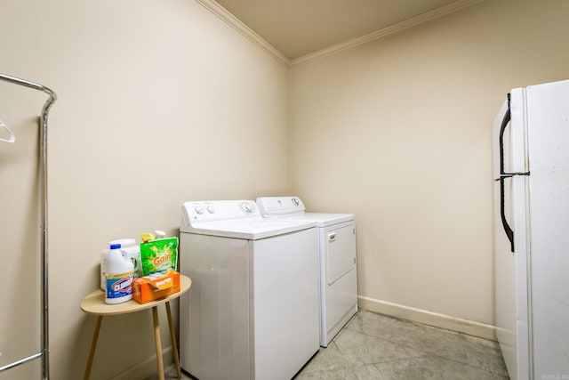 389 Tortoise Bay Rd, Higden, AR 72067 - laundry room featuring crown molding, independent washer and dryer, and baseboards