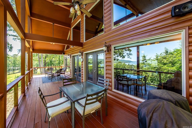 389 Tortoise Bay Rd, Higden, AR 72067 - wooden terrace featuring outdoor dining area, french doors, and a ceiling fan