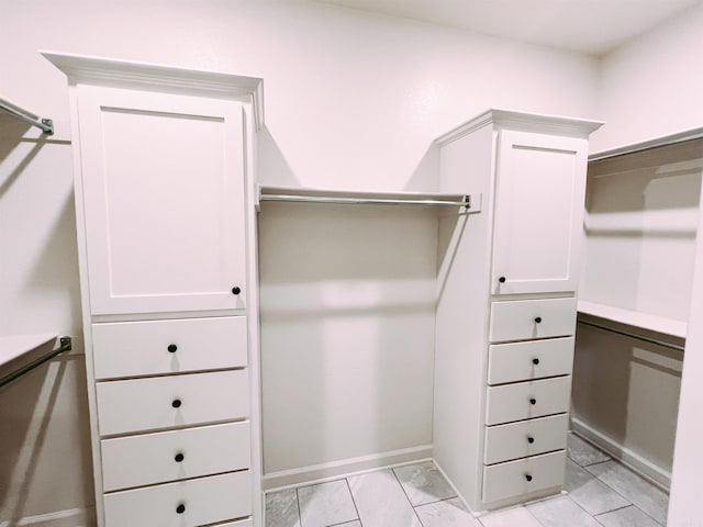 11 Shadow Creek Dr, Austin, AR 72007 - spacious closet featuring light marble finish floors