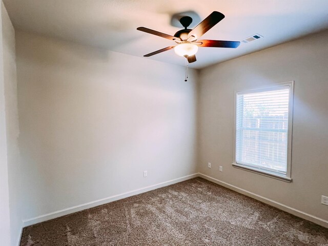 11 Shadow Creek Dr, Austin, AR 72007 - spare room featuring carpet flooring, ceiling fan, and baseboards