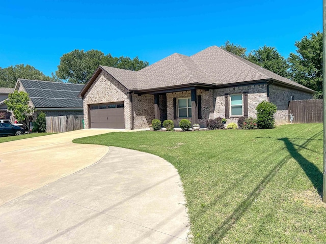 11 Shadow Creek Dr, Austin, AR 72007 - view of front of house with brick siding, driveway, a garage, and a shingled roof