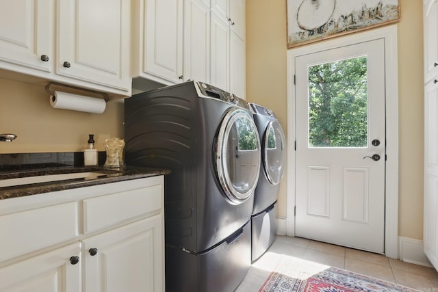 4 Dressage Ct, Little Rock, AR 72223 - laundry area with light tile patterned floors, cabinet space, independent washer and dryer, and baseboards