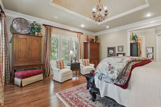 4 Dressage Ct, Little Rock, AR 72223 - bedroom with a tray ceiling, a chandelier, wood finished floors, ornamental molding, and recessed lighting