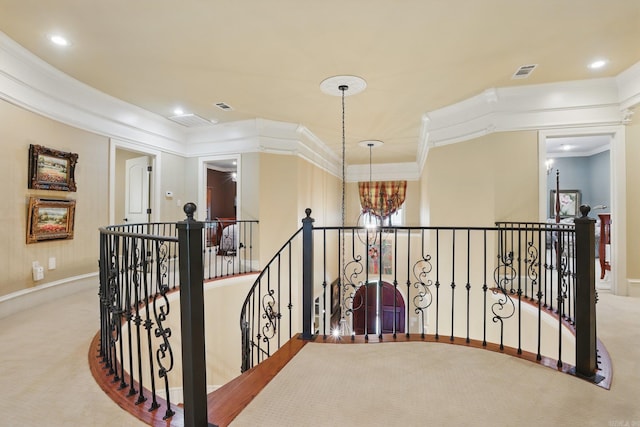 4 Dressage Ct, Little Rock, AR 72223 - hall featuring an upstairs landing, a chandelier, carpet flooring, crown molding, and recessed lighting
