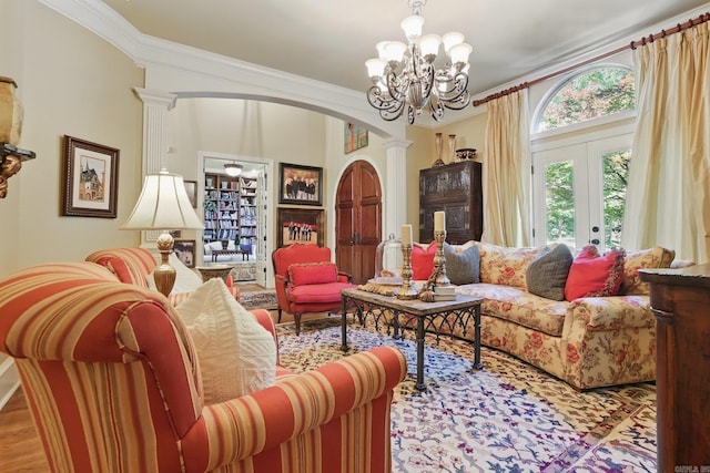 4 Dressage Ct, Little Rock, AR 72223 - living area featuring decorative columns, a chandelier, french doors, crown molding, and arched walkways