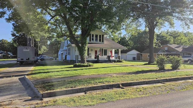 620 W 3rd St, Rector, AR 72461 - view of front facade featuring covered porch and a front yard
