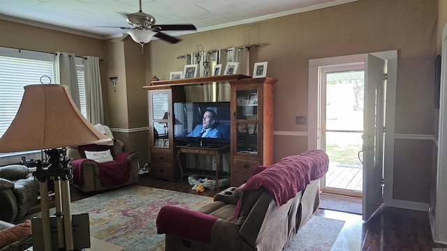 620 W 3rd St, Rector, AR 72461 - living area featuring crown molding, wood finished floors, and ceiling fan