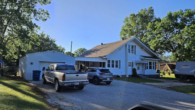 620 W 3rd St, Rector, AR 72461 - view of front of home featuring a detached garage and an outdoor structure